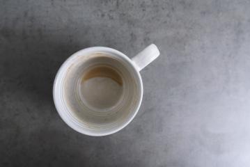 Empty coffee cup after drink on gray table- Stock Photo or Stock Video of rcfotostock | RC-Photo-Stock