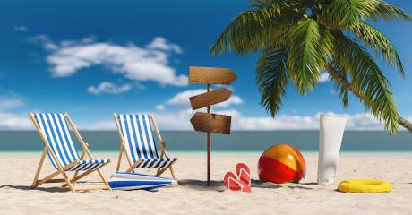 Empty deckchairs with flip-flop sandals, beach umbrella, suncream and signpost,  next to a palm tree at the beach during a summer vacation in the Caribbean- Stock Photo or Stock Video of rcfotostock | RC-Photo-Stock