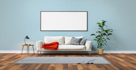 Empty white picture frame with Copy space on blue wall with sofa in the living room- Stock Photo or Stock Video of rcfotostock | RC Photo Stock