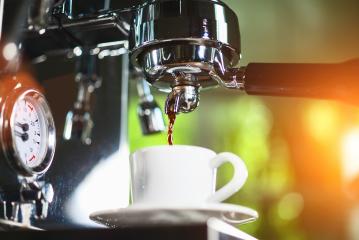 Espresso out of classic coffee machine into coffee cup- Stock Photo or Stock Video of rcfotostock | RC-Photo-Stock