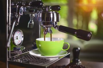 Espresso out of classic coffee machine into coffee cup- Stock Photo or Stock Video of rcfotostock | RC Photo Stock