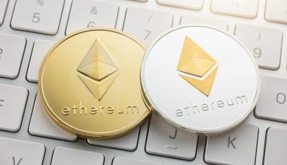 ethereum coins on keyboard cryptocurrency concept image- Stock Photo or Stock Video of rcfotostock | RC-Photo-Stock