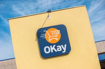 EUPEN, GERMANY OCTOBER, 2017: OKay supermarket logo on a Store. OKay is a neighbourhood stores supermarket chain of the Colruyt Group.- Stock Photo or Stock Video of rcfotostock | RC Photo Stock