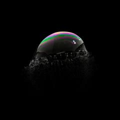 Exploding Soap Bubble in colorful colors on black background- Stock Photo or Stock Video of rcfotostock | RC Photo Stock