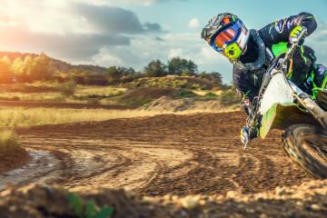 Extreme Motocross MX Rider riding on dirt track- Stock Photo or Stock Video of rcfotostock | RC-Photo-Stock