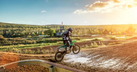 Extreme Motocross MX Rider riding on dirt track : Stock Photo or Stock Video Download rcfotostock photos, images and assets rcfotostock | RC Photo Stock.: