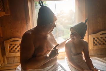 Father and daughter in finnish sauna, wearing felt hats, father talking and daughter listening. : Stock Photo or Stock Video Download rcfotostock photos, images and assets rcfotostock | RC Photo Stock.: