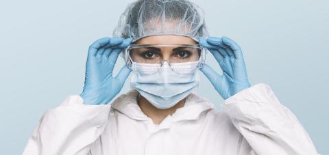 Female Doctor or Nurse Wearing latex protective gloves and medical Protective Mask and glasses on face. Protection for Coronavirus COVID-19- Stock Photo or Stock Video of rcfotostock | RC-Photo-Stock