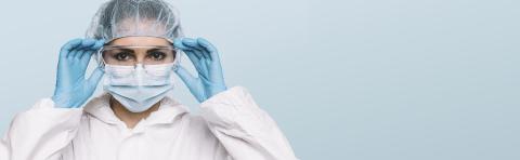 Female Doctor or Nurse Wearing latex protective gloves and medical Protective Mask and glasses on face. Protection for Coronavirus COVID-19, with copyspace for your individual text.- Stock Photo or Stock Video of rcfotostock | RC Photo Stock