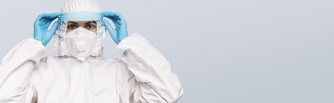 Female Doctor or Nurse Wearing latex protective gloves and medical Protective Mask with shield and glasses on face. Protection for Coronavirus COVID-19, with copyspace for your individual text.- Stock Photo or Stock Video of rcfotostock | RC-Photo-Stock