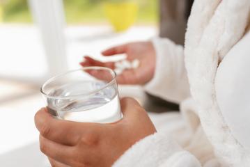 female hands with glass of water and tablets- Stock Photo or Stock Video of rcfotostock | RC Photo Stock
