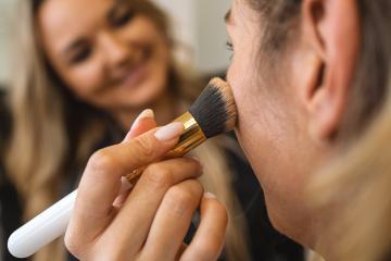 Female makeup artist applying makeup with powder brusht to custo : Stock Photo or Stock Video Download rcfotostock photos, images and assets rcfotostock | RC Photo Stock.: