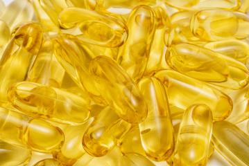 Fish oil supplement capsule source of omega 3 isolated on white background- Stock Photo or Stock Video of rcfotostock | RC-Photo-Stock