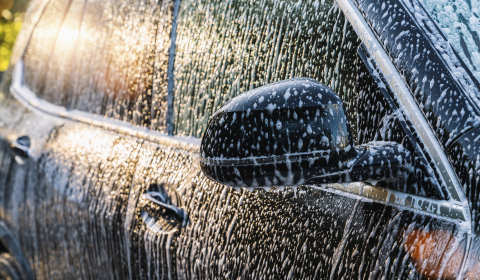 foam on a black car, washing a car at a wash service, background image- Stock Photo or Stock Video of rcfotostock | RC Photo Stock