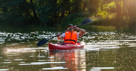 Focused man in a red kayak on a sparkling river, paddling with concentration in the evening light in germany. Kayak Water Sports concept image- Stock Photo or Stock Video of rcfotostock | RC Photo Stock