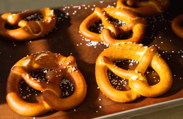 Fresh Bavarian pretzels with salt on a baking tray from the bakery : Stock Photo or Stock Video Download rcfotostock photos, images and assets rcfotostock | RC Photo Stock.: