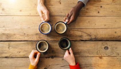 Friends group drinking coffee in a bar restaurant - People hands cheering and toasting on top view point - Social gathering concept with white and black men and women together- Stock Photo or Stock Video of rcfotostock | RC Photo Stock