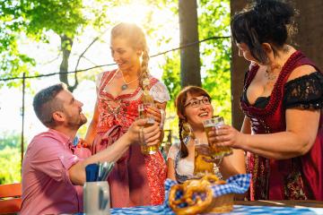 Friends in Bavarian beer garden drinking in summer- Stock Photo or Stock Video of rcfotostock | RC Photo Stock