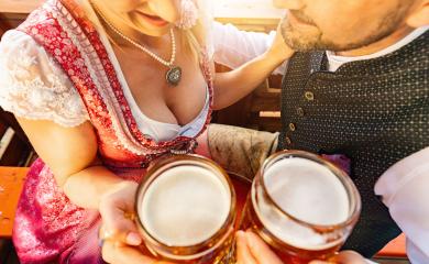 friends with a fresh beer in a Beer garden, close-up on beer mugs at oktoberfest- Stock Photo or Stock Video of rcfotostock | RC Photo Stock