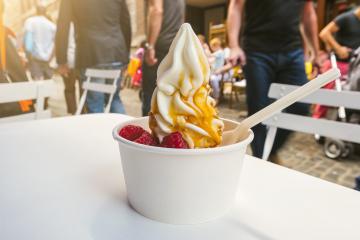 frozen yoghurt with toppings on a table in the city- Stock Photo or Stock Video of rcfotostock | RC-Photo-Stock