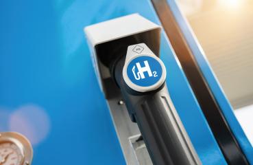fuel dispenser with hydrogen logo on gas station. h2 combustion engine for emission free eco friendly transport concept image- Stock Photo or Stock Video of rcfotostock | RC Photo Stock