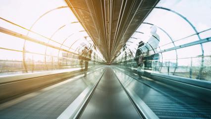 futuristic skywalk with blurred passengers : Stock Photo or Stock Video Download rcfotostock photos, images and assets rcfotostock | RC Photo Stock.: