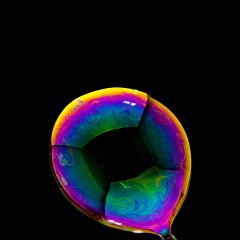 fyling Soap Bubble in colorful colors on black background- Stock Photo or Stock Video of rcfotostock | RC-Photo-Stock