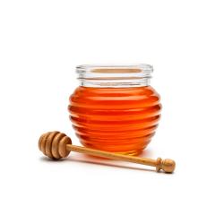 Glass of honey in a jar with a wooden honey dipper, isolated on white background- Stock Photo or Stock Video of rcfotostock | RC-Photo-Stock