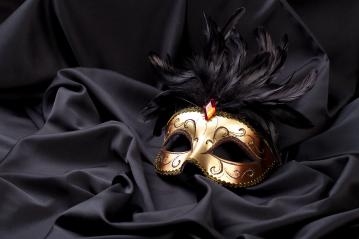 gold mask on black silk : Stock Photo or Stock Video Download rcfotostock photos, images and assets rcfotostock | RC-Photo-Stock.:
