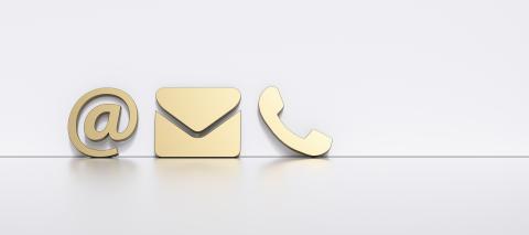 golden contact icons leaning against a wall as a hotline and service panorama concept - Stock Photo or Stock Video of rcfotostock | RC Photo Stock