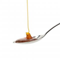 golden honey on a spoon : Stock Photo or Stock Video Download rcfotostock photos, images and assets rcfotostock | RC-Photo-Stock.: