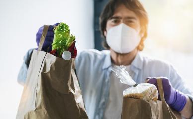 Grocery shopping as a delivery service for quarantined seniors at the Covid-19 Coronavirus Sars-CoV-2 epidemic- Stock Photo or Stock Video of rcfotostock | RC-Photo-Stock