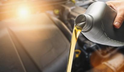 Hand Pouring oil to car engine, Fresh oil poured during an oil change to a car.- Stock Photo or Stock Video of rcfotostock | RC Photo Stock