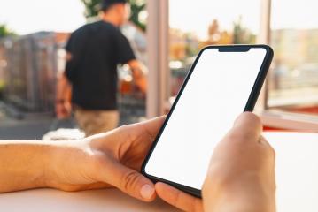 hands holding black mobile phone with blank desktop screen at summer in the city, Mockup image : Stock Photo or Stock Video Download rcfotostock photos, images and assets rcfotostock | RC Photo Stock.: