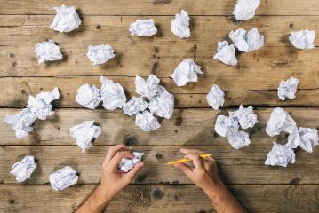Hands holding crumpled paper ball and pen to gather ideas. Brainstorming Concept image : Stock Photo or Stock Video Download rcfotostock photos, images and assets rcfotostock | RC Photo Stock.: