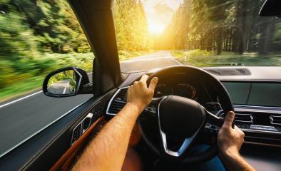 hands of car driver on steering wheel, Driving car at summer day on a country road, having fun driving the empty highway on tour journey - POV, first person view shot- Stock Photo or Stock Video of rcfotostock | RC Photo Stock
