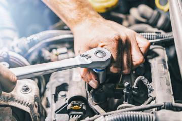 Hands of car mechanic with wrench in garage : Stock Photo or Stock Video Download rcfotostock photos, images and assets rcfotostock | RC-Photo-Stock.: