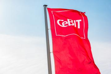 HANNOVER, GERMANY MARCH, 2017: Cebit sign on a flag against blue sky. The Cebit is the biggest trade fair for information technology in the world. : Stock Photo or Stock Video Download rcfotostock photos, images and assets rcfotostock | RC Photo Stock.: