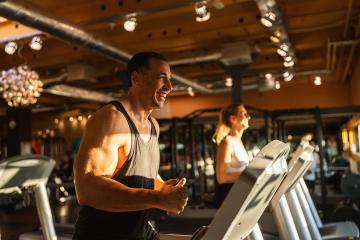 Happy men and woman in the gym running on treadmill : Stock Photo or Stock Video Download rcfotostock photos, images and assets rcfotostock | RC Photo Stock.: