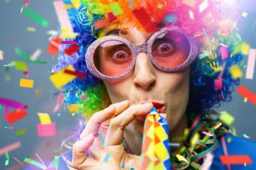 happy party woman with wig and confetti pieces and ribbon Falling in colorful colors- Stock Photo or Stock Video of rcfotostock | RC Photo Stock