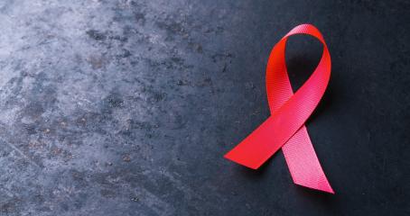 healthcare and medicine concept. Aids Awareness. red AIDS awareness ribbon on black background. copyspace for your individual text. - Stock Photo or Stock Video of rcfotostock | RC-Photo-Stock