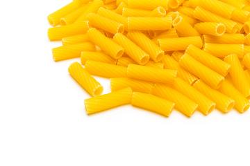 heap of iitalian Tortiglioni noodels on white- Stock Photo or Stock Video of rcfotostock | RC Photo Stock