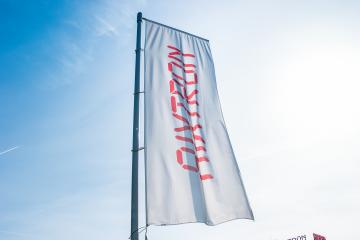 HERZOGENRATH, GERMANY MARCH, 2017: Aixtron flag against blue sky. The engineering company.produces equipment for the production of compound semiconductors and other multicomponent materials.- Stock Photo or Stock Video of rcfotostock | RC-Photo-Stock