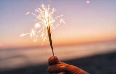 holding sparklers at beach- Stock Photo or Stock Video of rcfotostock | RC-Photo-Stock