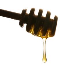 honey dipper with dropping honey- Stock Photo or Stock Video of rcfotostock | RC-Photo-Stock