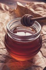 honey falling from the dipper to the glass jar : Stock Photo or Stock Video Download rcfotostock photos, images and assets rcfotostock | RC-Photo-Stock.: