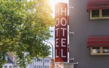 Hotel sign on a building- Stock Photo or Stock Video of rcfotostock | RC-Photo-Stock