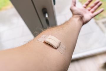 Human arm after Vaccination with adhesive plaster : Stock Photo or Stock Video Download rcfotostock photos, images and assets rcfotostock | RC-Photo-Stock.: