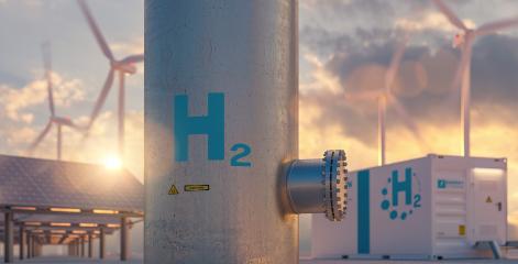 Hydrogen energy storage gas tank with solar panels, wind turbine and energy storage container unit in background at sunset- Stock Photo or Stock Video of rcfotostock | RC Photo Stock