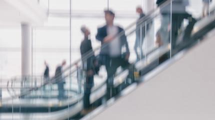Intentionally blurred business people escalator- Stock Photo or Stock Video of rcfotostock | RC-Photo-Stock